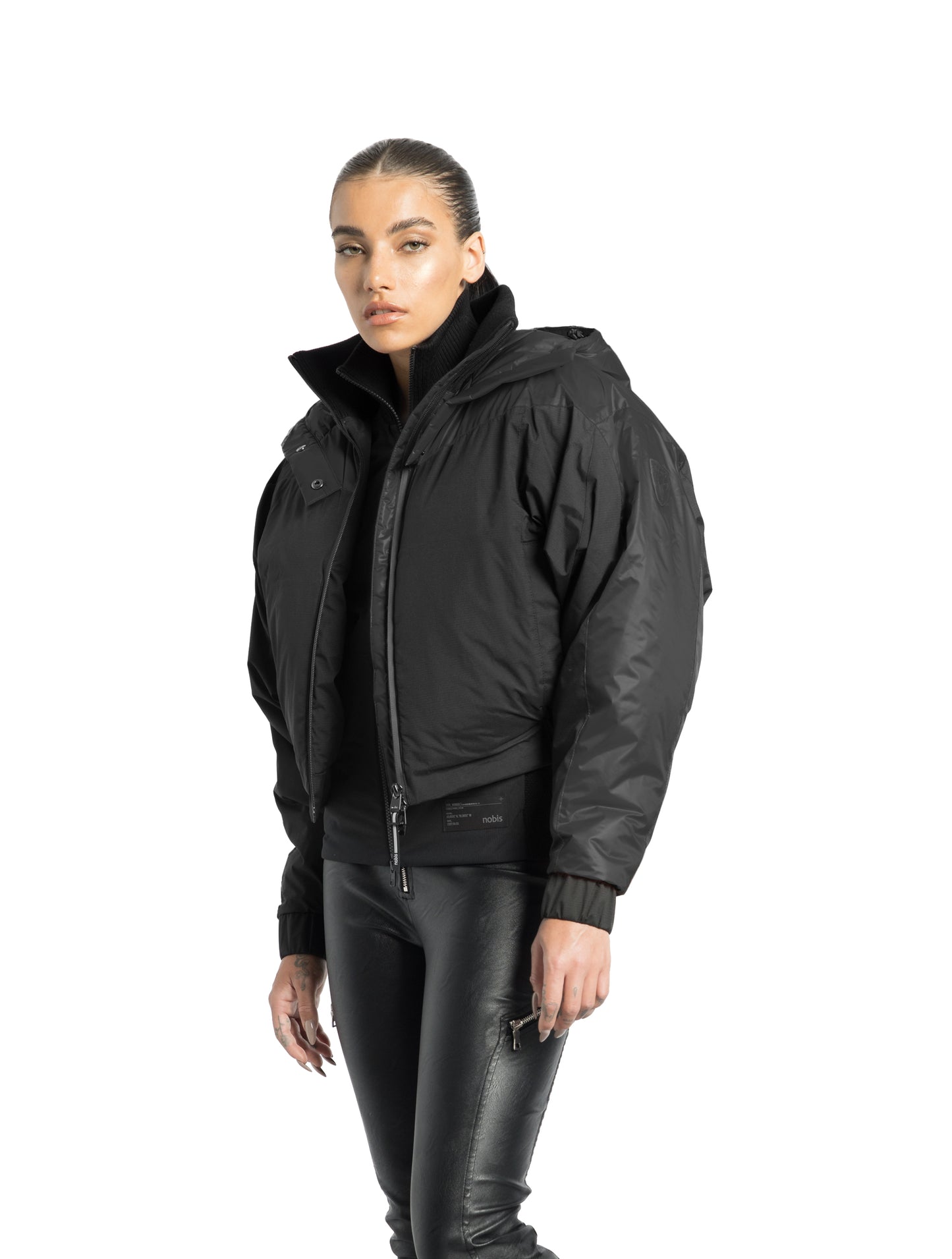 Aspen Women's Batwing Jacket in hip length, premium stretch ripstop and cire technical nylon taffeta fabrication, Premium Canadian White Duck Down insulation, non-removable down-filled hood, centre front two-way zipper, winged arm detailing, in Black