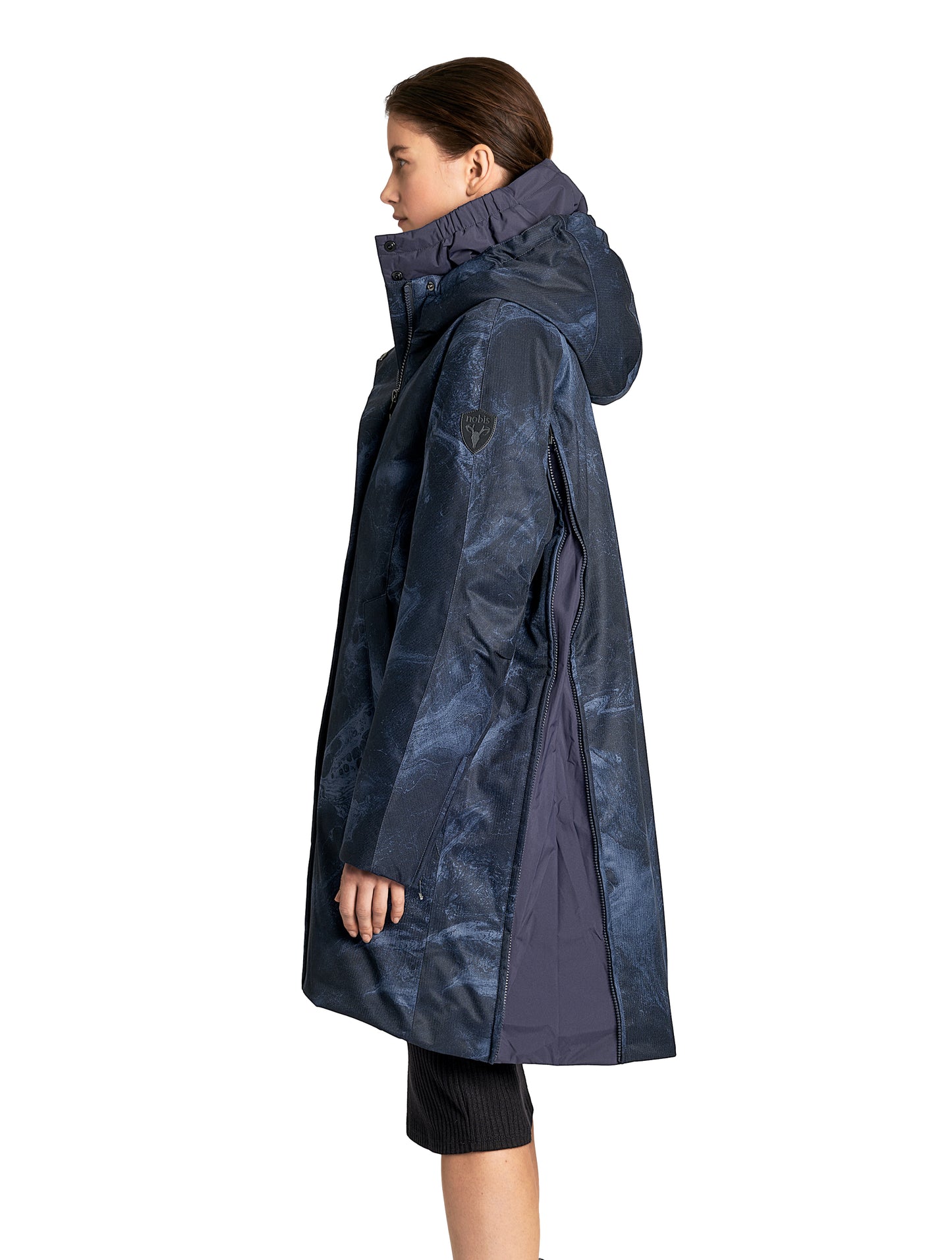 Dory Women's Tailored Back Zip Parka in knee length, premium Crosshatch fabrication, Premium Canadian White Duck Down insulation, non-removable down-filled hood, removable interior hood, centre front two-way zipper with wind flap, vertical zipper detailing along back, in Navy