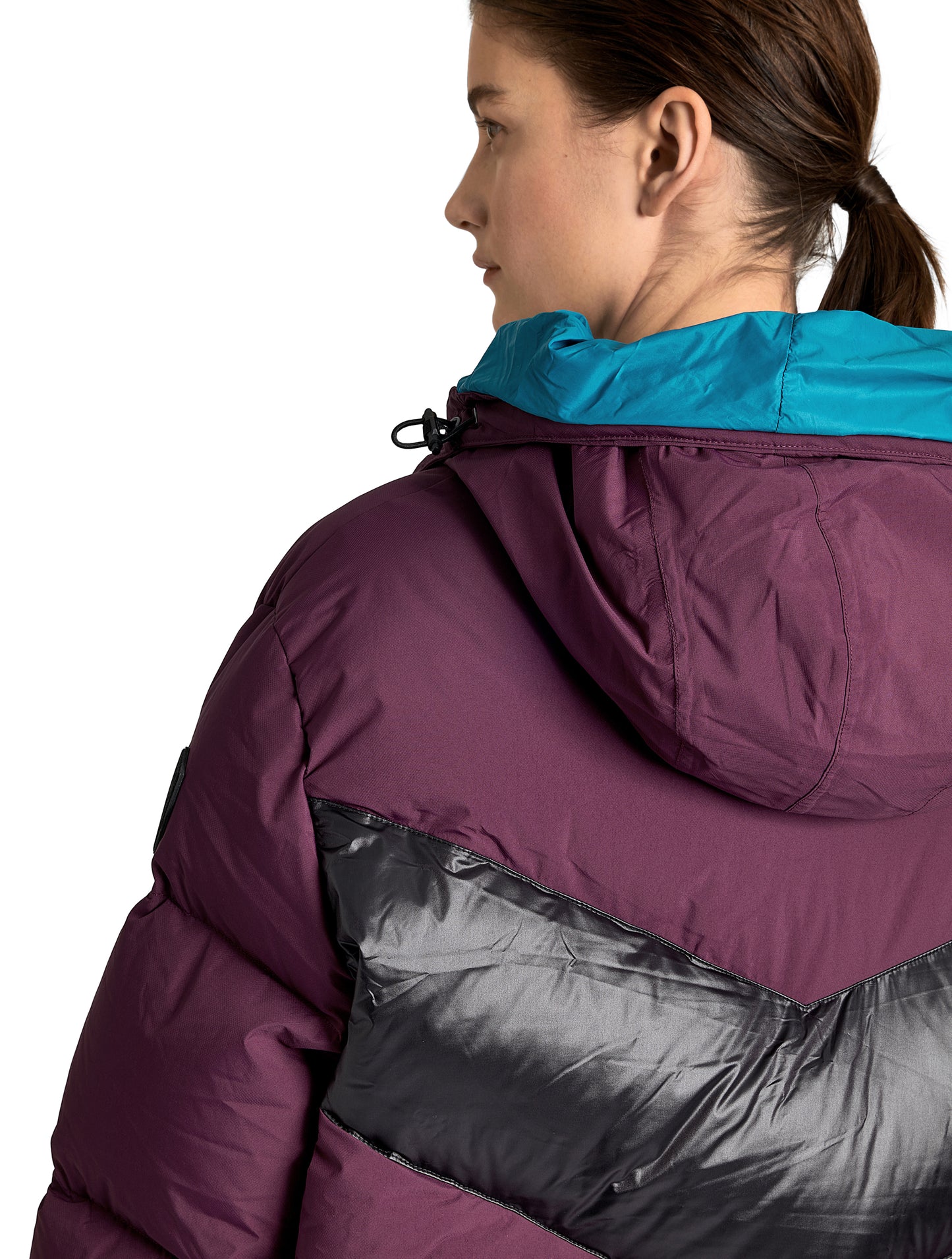 Isla Women's Chevron Quilted Puffer Jacket in thigh length, premium technical nylon taffeta fabrication, Premium Canadian origin White Duck Down insulation, non-removable down-filled hood, two-way centre-front zipper, zipper pockets at waist, contrast cire technical nylon taffeta detailing on chest and back, in Potent Purple