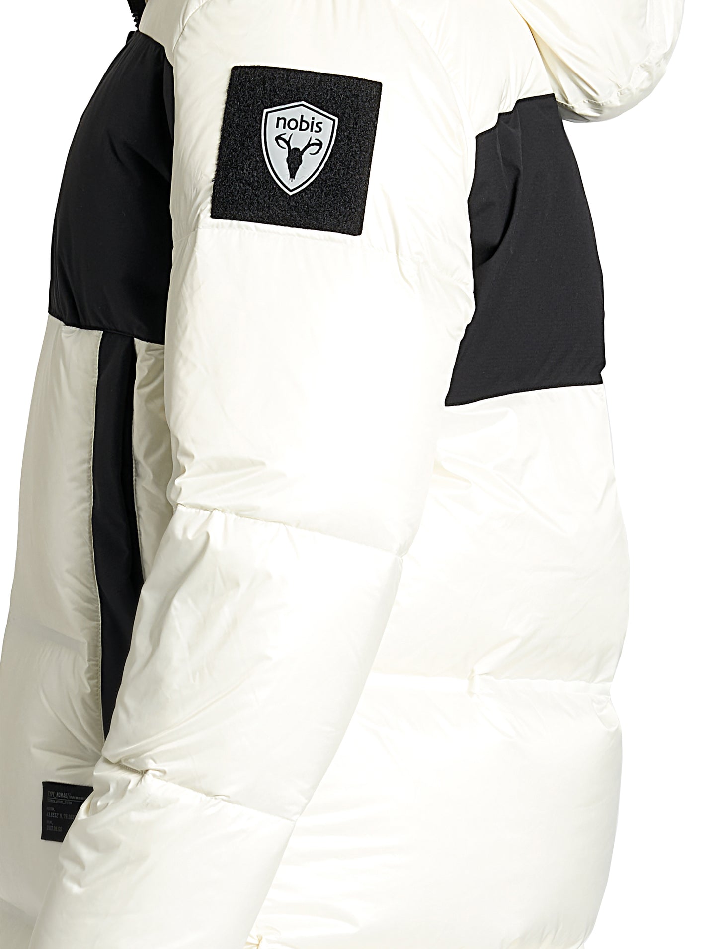 Neelix Men's Long Puffer Jacket in thigh length, premium cire technical nylon taffeta and stretch ripstop fabrication, Premium Canadian origin White Duck Down insulation, non-removable down-filled hood, two-way centre-front zipper, pit zipper vents, hidden chest zipper pockets, fleece-lined magnetic closure waist pockets, in Chalk