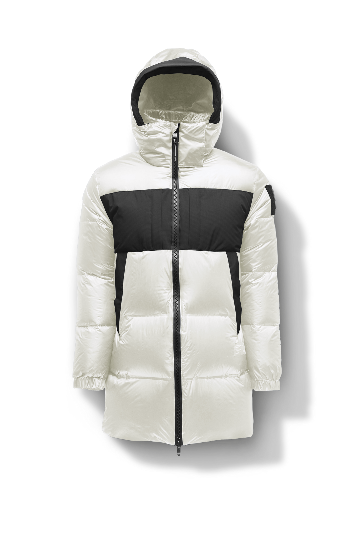 Neelix Men's Long Puffer Jacket in thigh length, premium cire technical nylon taffeta and stretch ripstop fabrication, Premium Canadian origin White Duck Down insulation, non-removable down-filled hood, two-way centre-front zipper, pit zipper vents, hidden chest zipper pockets, fleece-lined magnetic closure waist pockets, in Chalk