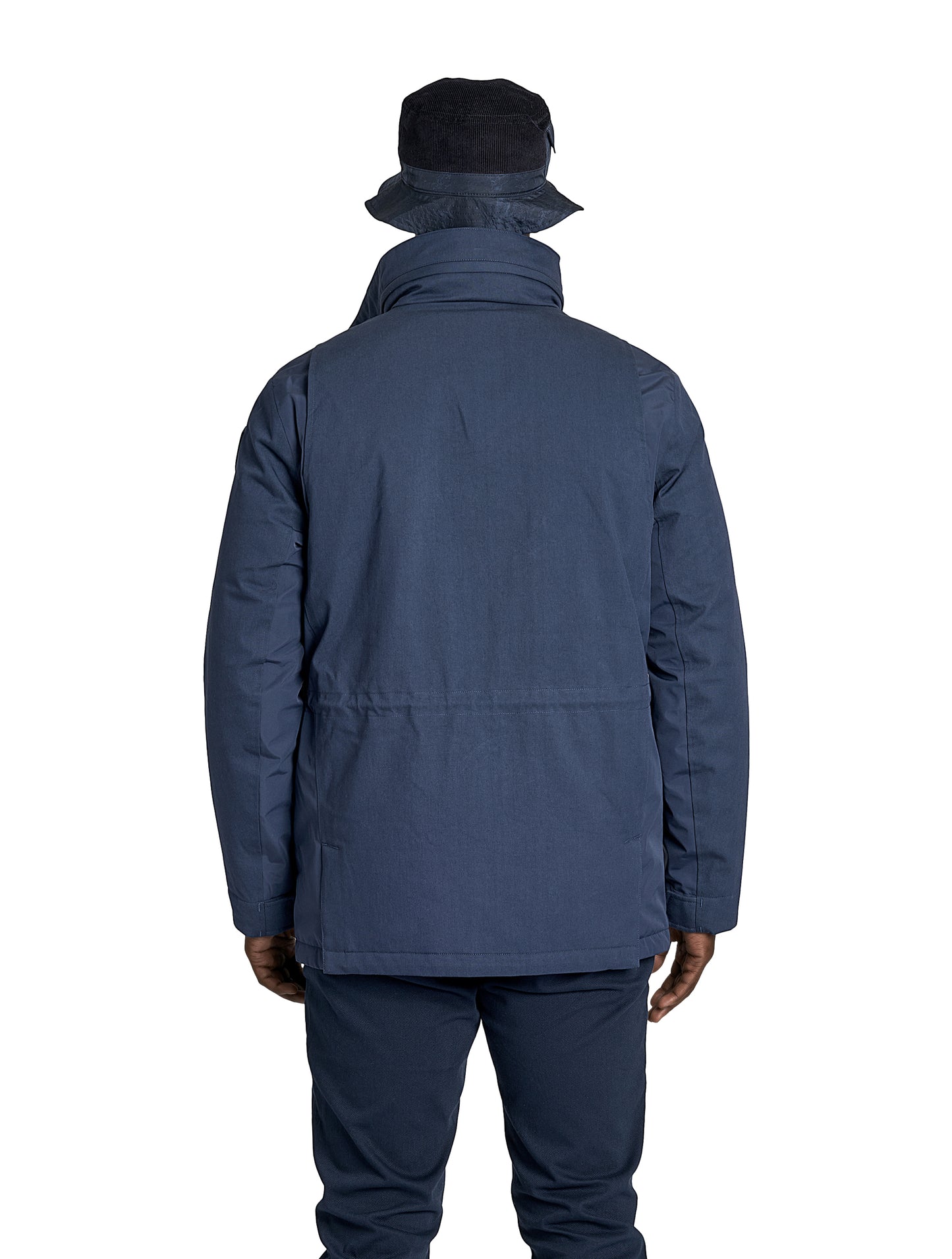 Pelican Men's Tailored Field Jacket in hip length, premium cotton blend and 3-ply micro denier fabrication, Premium Canadian origin White Duck Down insulation, tuck away, waterproof hood in premium cire technical nylon taffeta, two-way centre-front zipper with magnetic wind flap, pit zipper vents, magnetic closure chest and waist flap pockets, hidden adjustable waist drawcord, and action back detailing, in Navy