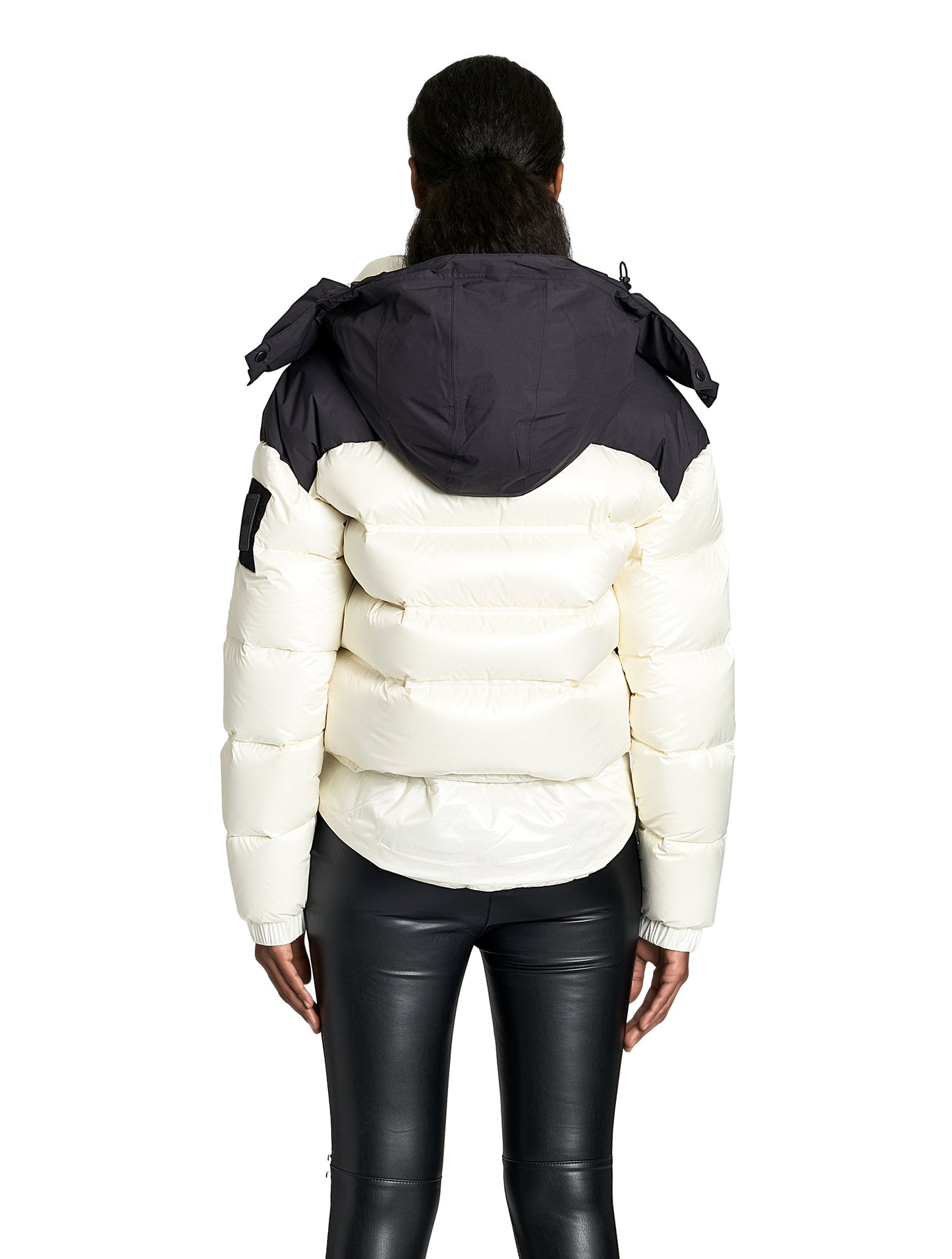 Tempus Women's Performance Short Puffer Jacket in waist length, premium technical nylon taffeta fabrication, Premium Canadian origin White Duck Down insulation, removable down-filled hood, two-way centre-front zipper, fleece-lined zipper pockets at waist, pit zipper vents, in Chalk