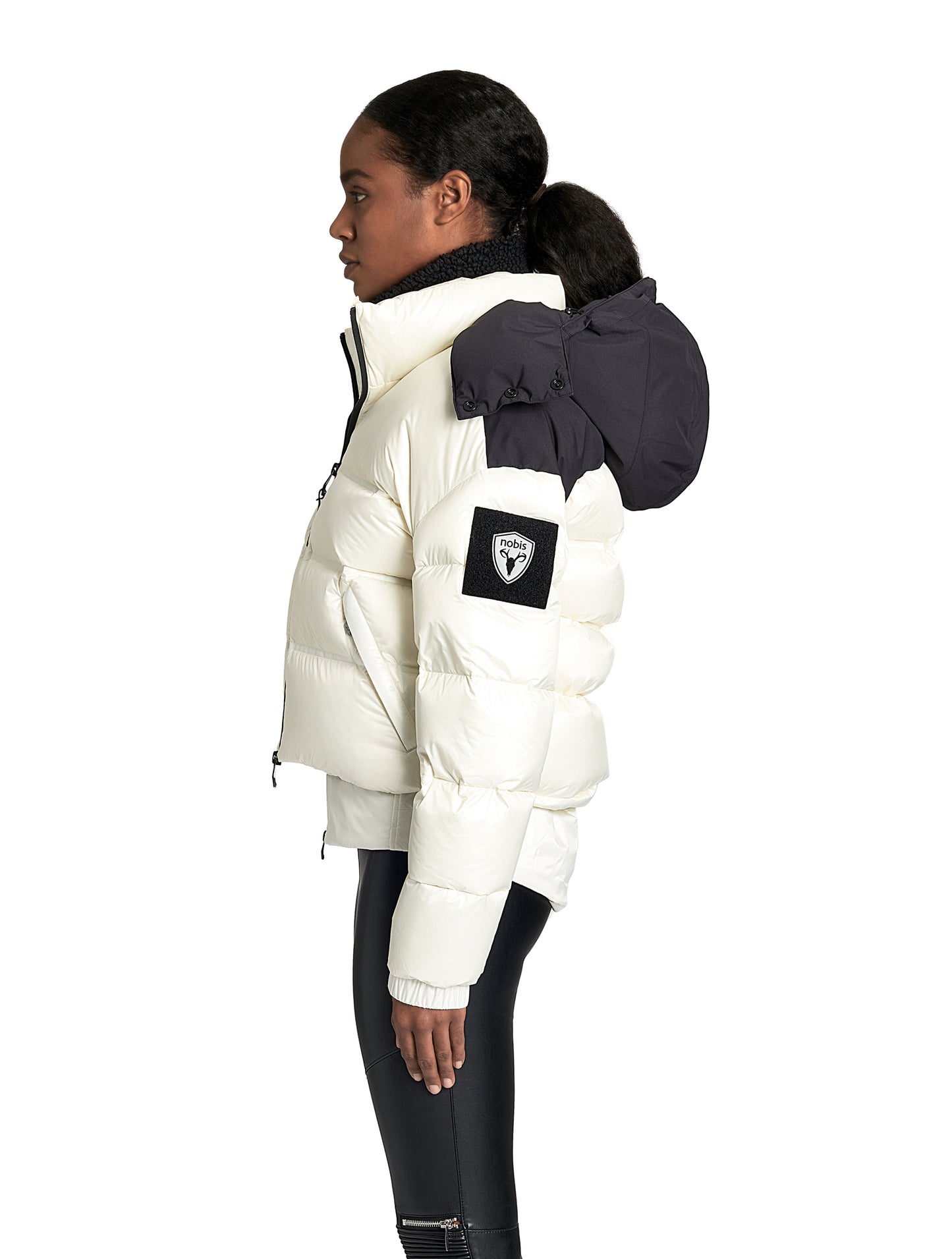 Tempus Women's Performance Short Puffer Jacket in waist length, premium technical nylon taffeta fabrication, Premium Canadian origin White Duck Down insulation, removable down-filled hood, two-way centre-front zipper, fleece-lined zipper pockets at waist, pit zipper vents, in Chalk