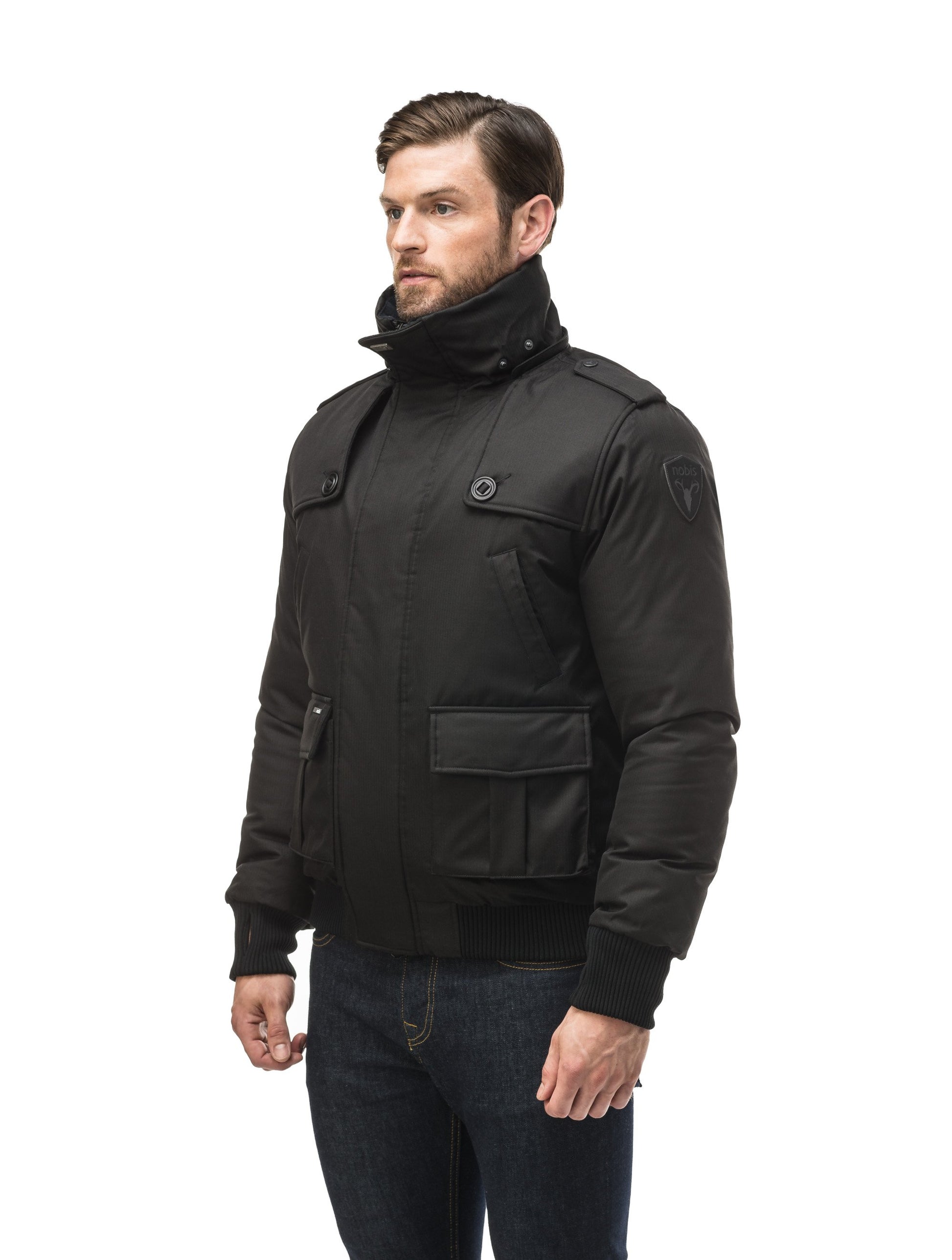 Men's down filled bomber that sits just above the hips with a completely removable hood that's windproof, waterproof, and breathable in Black