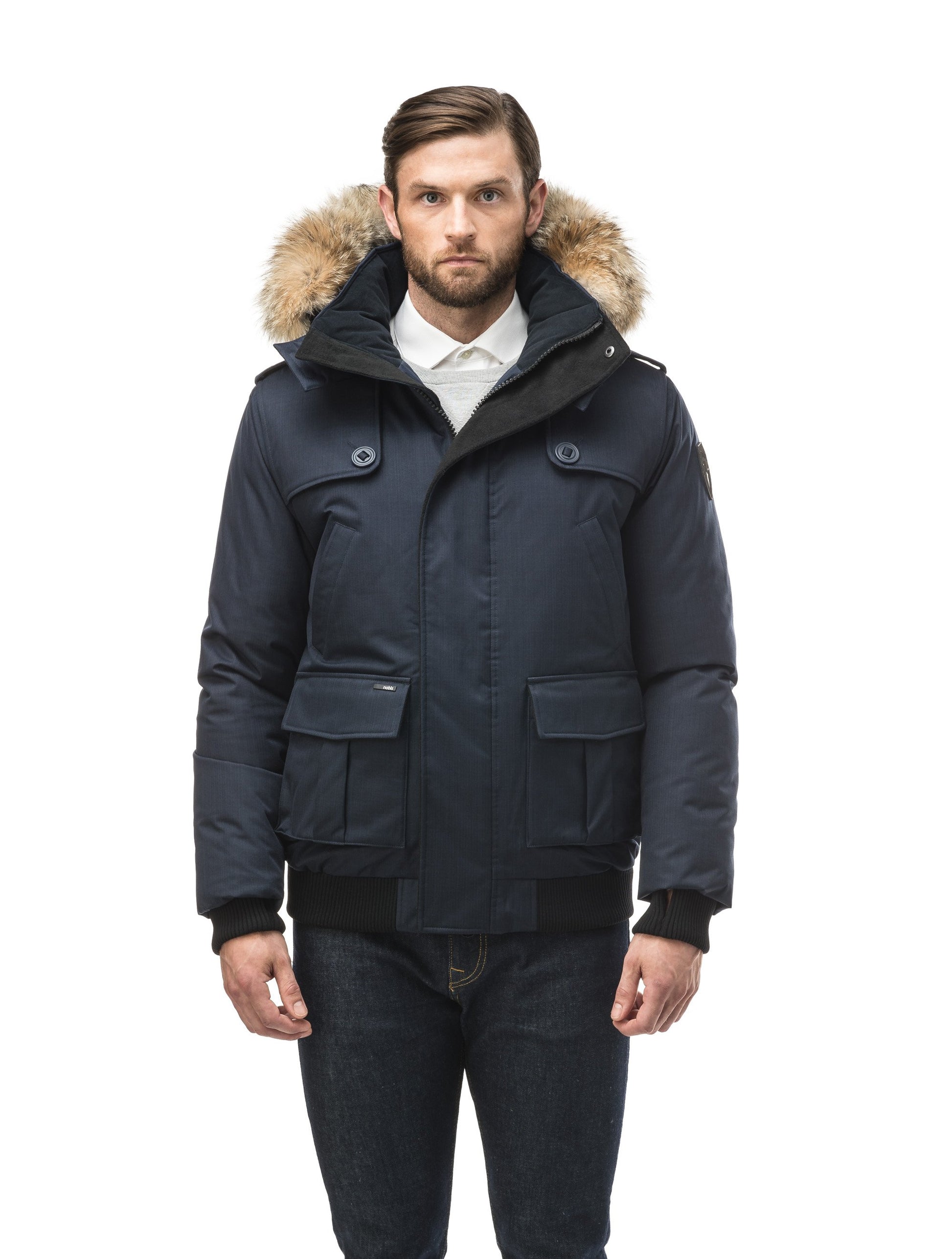 Men's down filled bomber that sits just above the hips with a completely removable hood that's windproof, waterproof, and breathable in CH Light Grey