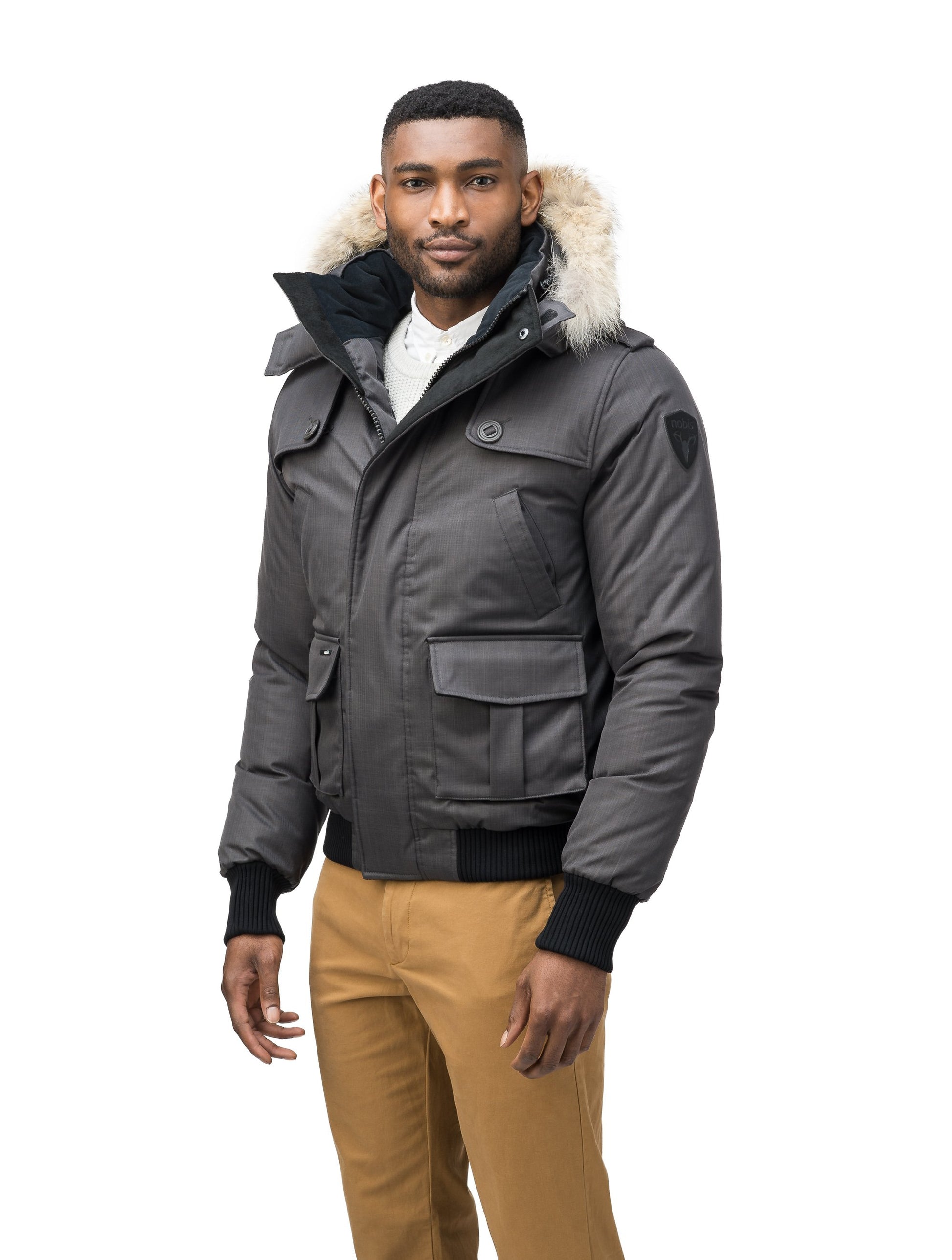 Men's down filled bomber that sits just above the hips with a completely removable hood that's windproof, waterproof, and breathable in H. Charcoal
