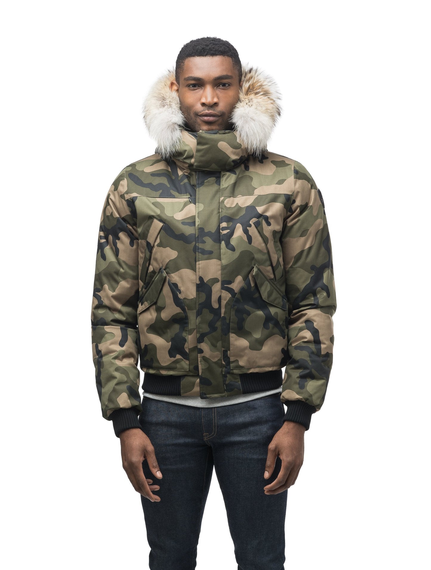 Men's classic down filled bomber jacket with a down filled hood that features a removable coyote fur trim and concealed moldable framing wire in Camo