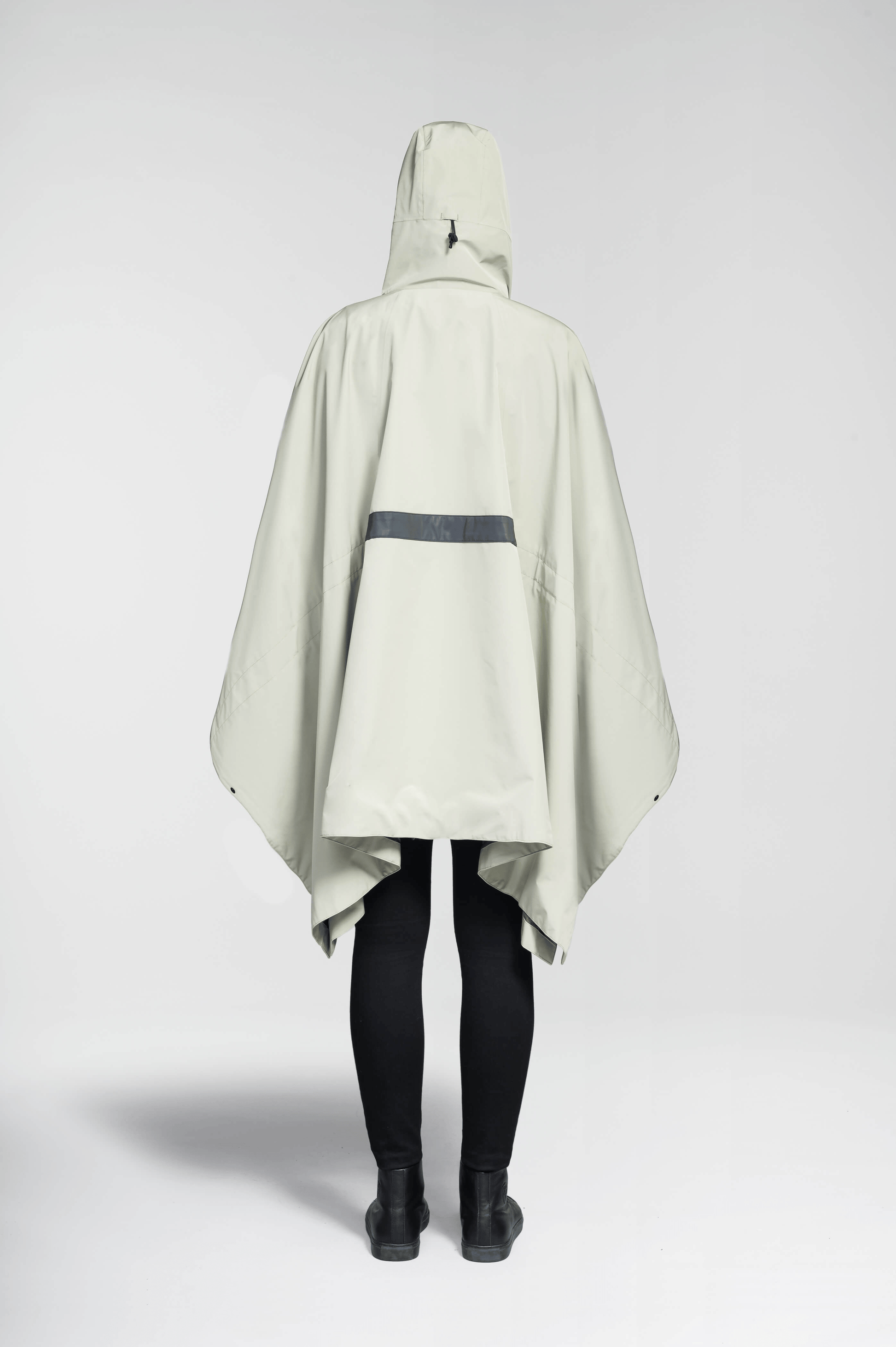 Hydra Unisex Performance Poncho in thigh length, non-removable hood, vertical half-zipper along centre front collar, hidden side-entry waist zipper pockets, adjustable webbing straps and snap closure cuffs, and packable to front kangaroo pocket with flap opening, in Tea