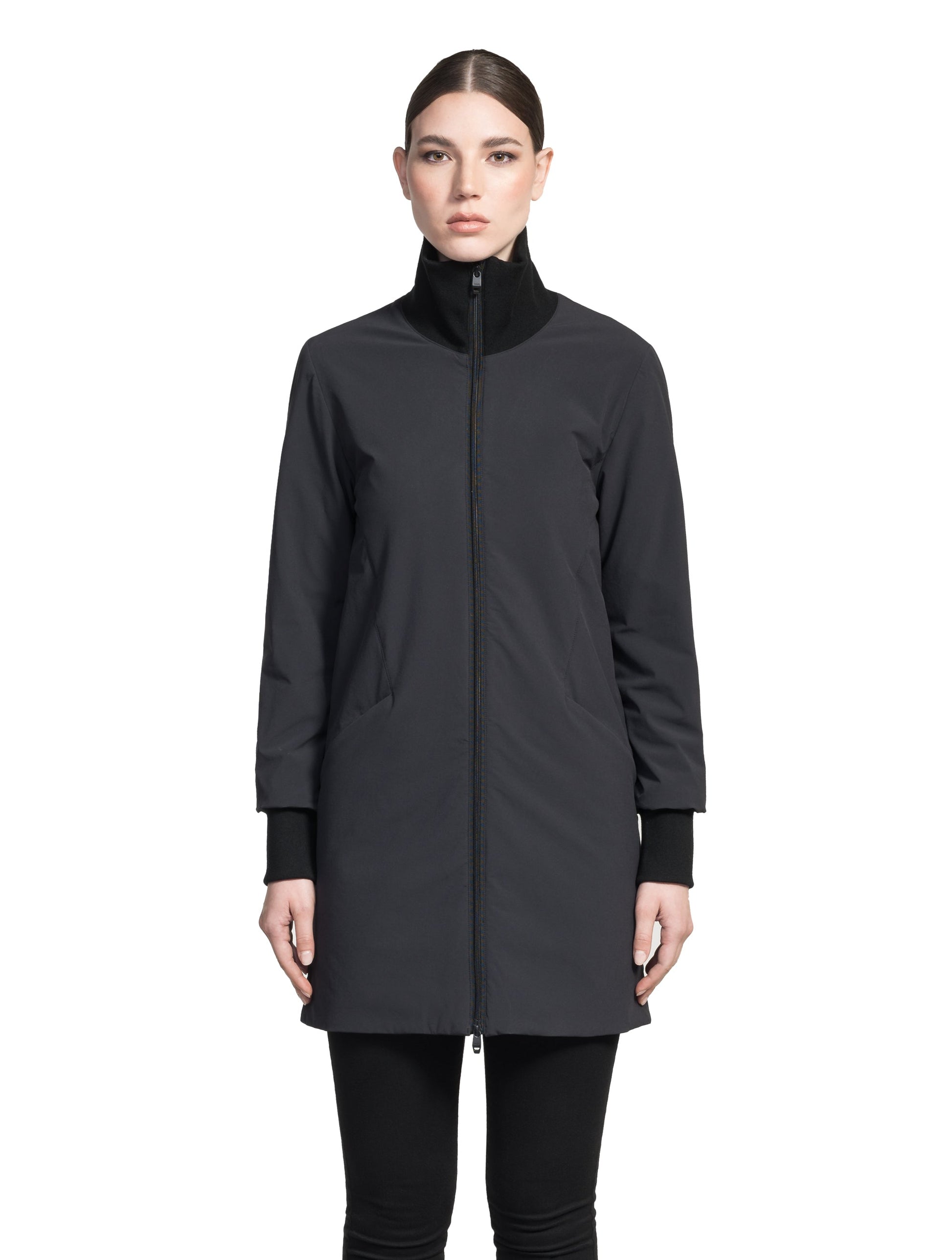 Mora Ladies Mid Layer Rib Neck Jacket in thigh length, Primaloft insulation, ribbing at collar and cuffs, and two-way front zipper, in Black