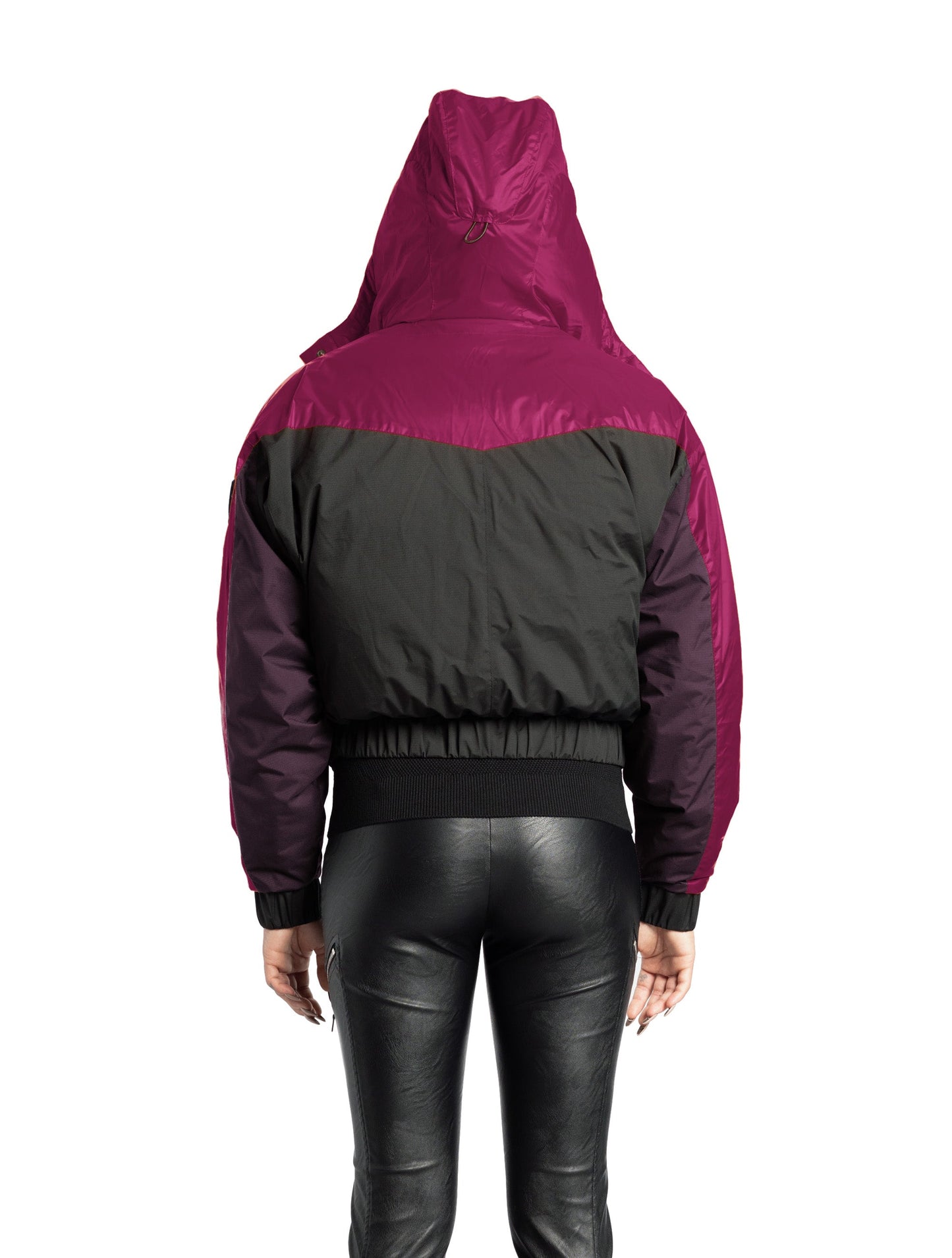 Aspen Women's Batwing Jacket in hip length, premium stretch ripstop and cire technical nylon taffeta fabrication, Premium Canadian White Duck Down insulation, non-removable down-filled hood, centre front two-way zipper, winged arm detailing, in Festival Fushia/Potent Purple