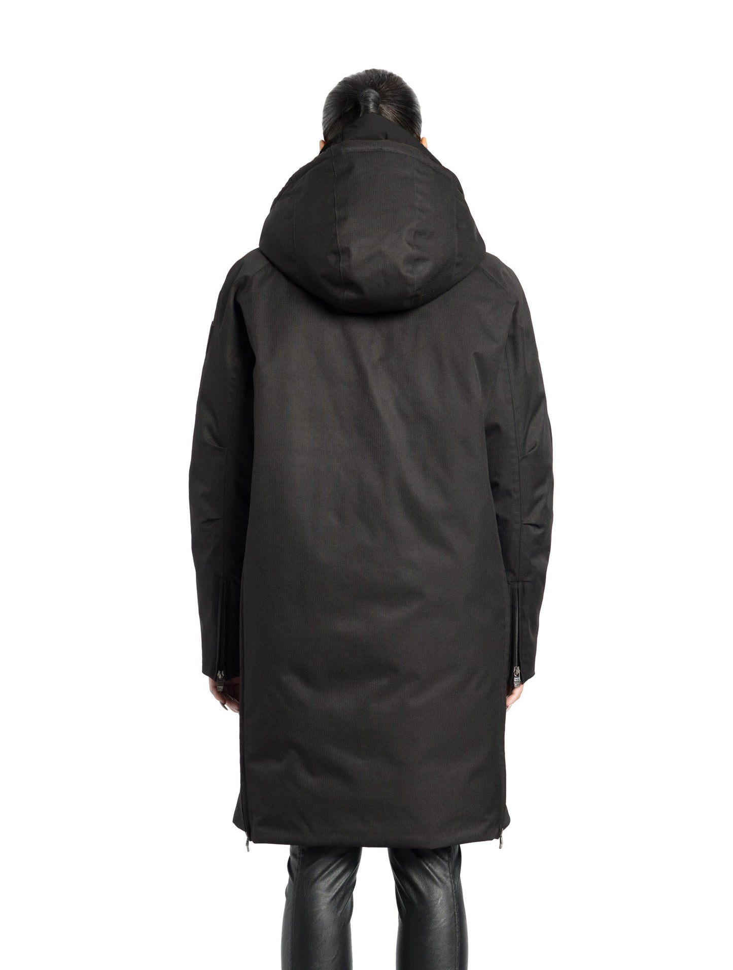 Dory Women's Tailored Back Zip Parka in knee length, premium Crosshatch fabrication, Premium Canadian White Duck Down insulation, non-removable down-filled hood, removable interior hood, centre front two-way zipper with wind flap, vertical zipper detailing along back, in Black