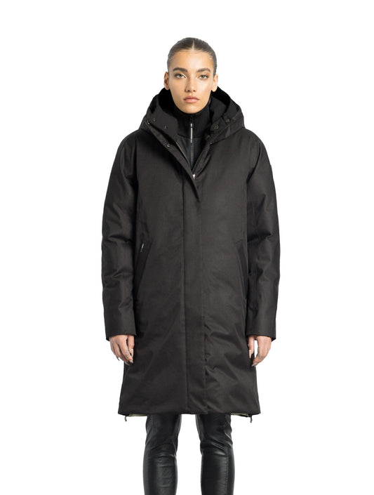 Dory Women's Tailored Back Zip Parka in knee length, premium Crosshatch fabrication, Premium Canadian White Duck Down insulation, non-removable down-filled hood, removable interior hood, centre front two-way zipper with wind flap, vertical zipper detailing along back, in Black