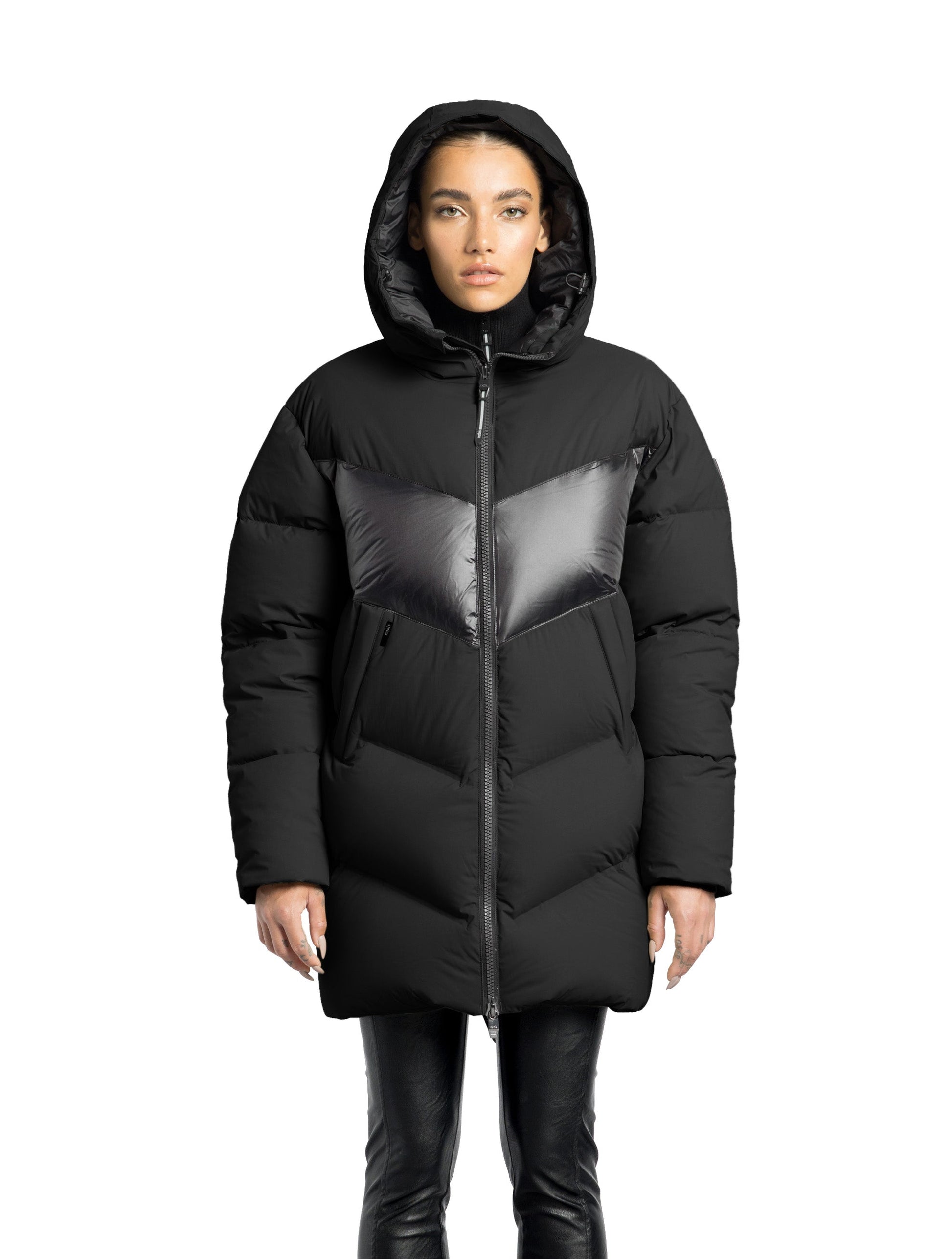 Isla Women's Chevron Quilted Puffer Jacket in thigh length, premium technical nylon taffeta fabrication, Premium Canadian origin White Duck Down insulation, non-removable down-filled hood, two-way centre-front zipper, zipper pockets at waist, contrast cire technical nylon taffeta detailing on chest and back, in Black