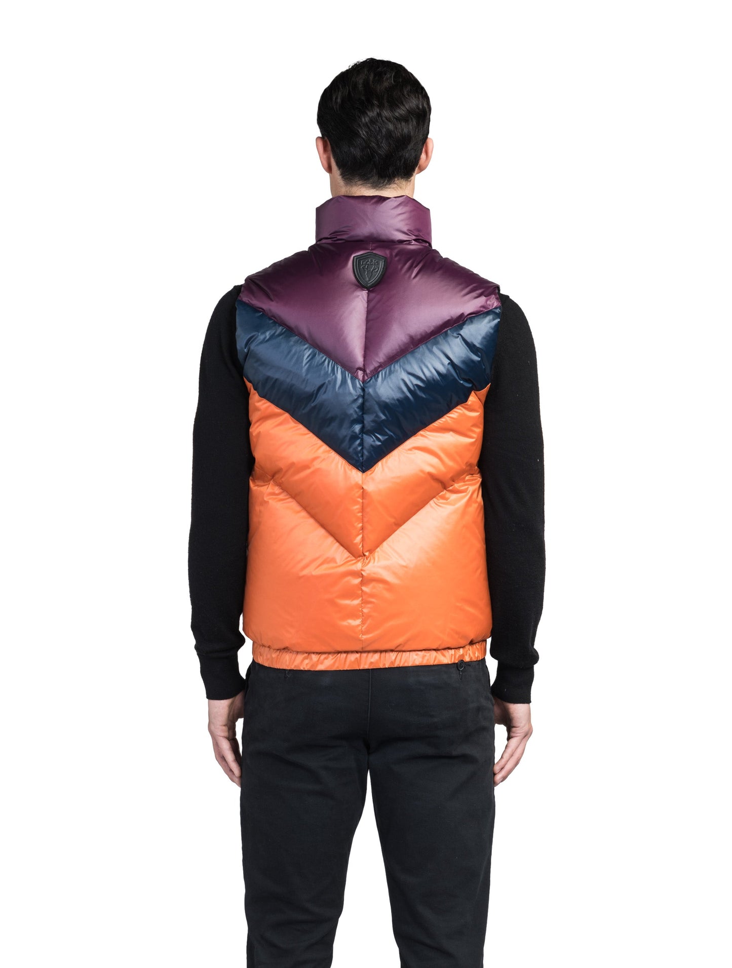 Kylo Men's Chevron Quilted Vest in hip length, premium cire technical nylon taffeta fabrication, Premium Canadian origin White Duck Down insulation, two-way centre-front zipper, fleece-lined pockets at waist, elasticized waistband, in Burnt Orange