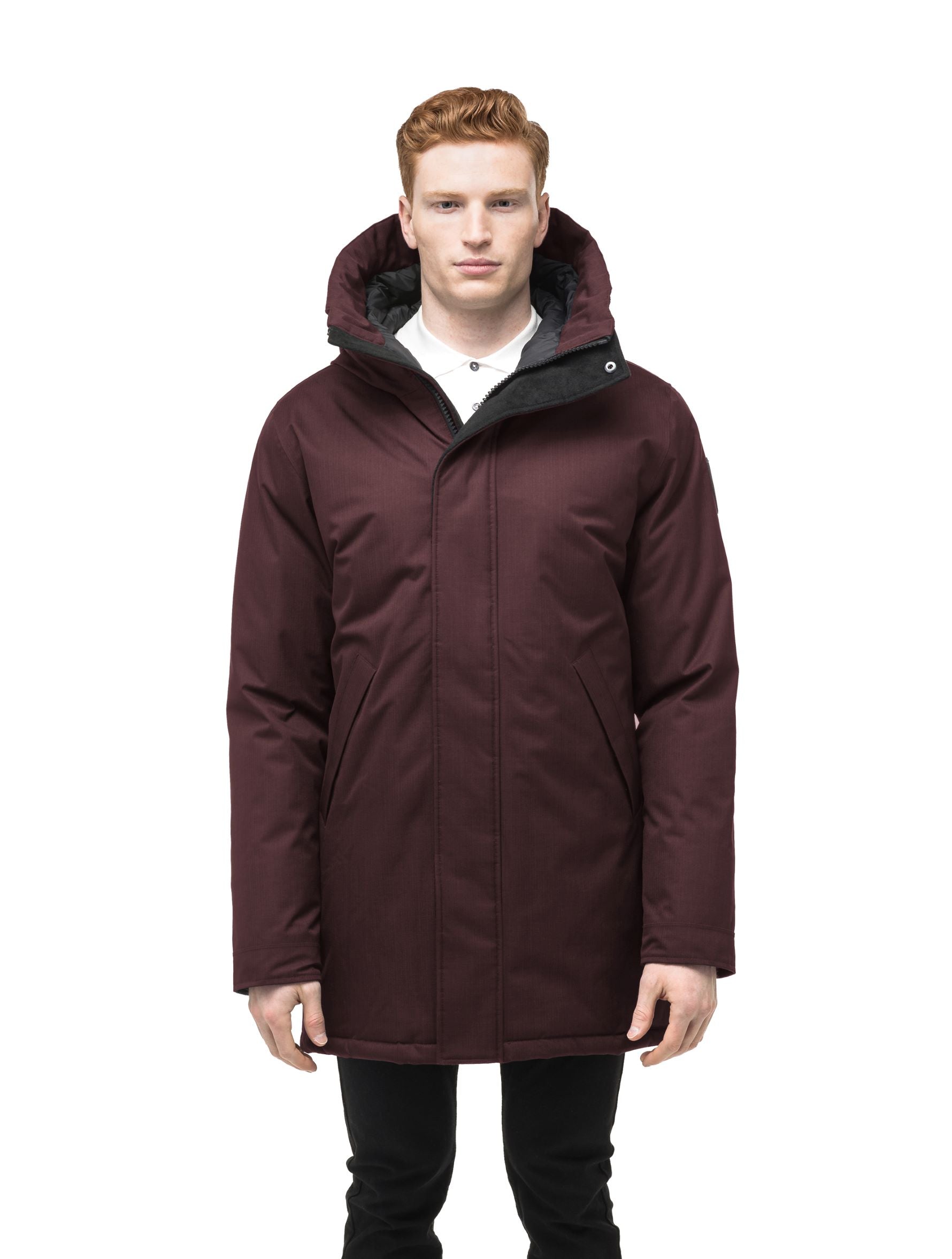 Pierre Men's Jacket in thigh length, Canadian white duck down insulation, non-removable down-filled hood, angled waist pockets, centre-front zipper with wind flap, and elastic ribbed cuffs, in Merlot