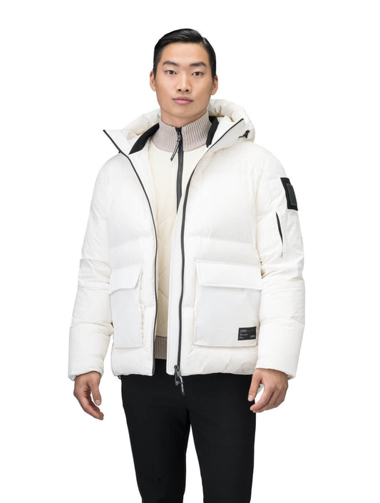 Supra Men's Performance Puffer in hip length, Technical Taffeta and 3-Ply Micro Denier fabrication, Premium Canadian White Duck Down insulation, non-removable down filled hood, centre front two-way zipper, flap pockets at waist, and zipper pocket at left bicep, in Wheat Desert