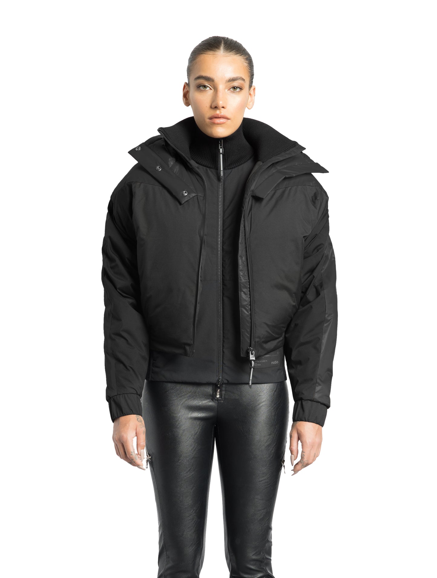 Aspen Women's Batwing Jacket in hip length, premium stretch ripstop and cire technical nylon taffeta fabrication, Premium Canadian White Duck Down insulation, non-removable down-filled hood, centre front two-way zipper, winged arm detailing, in Black