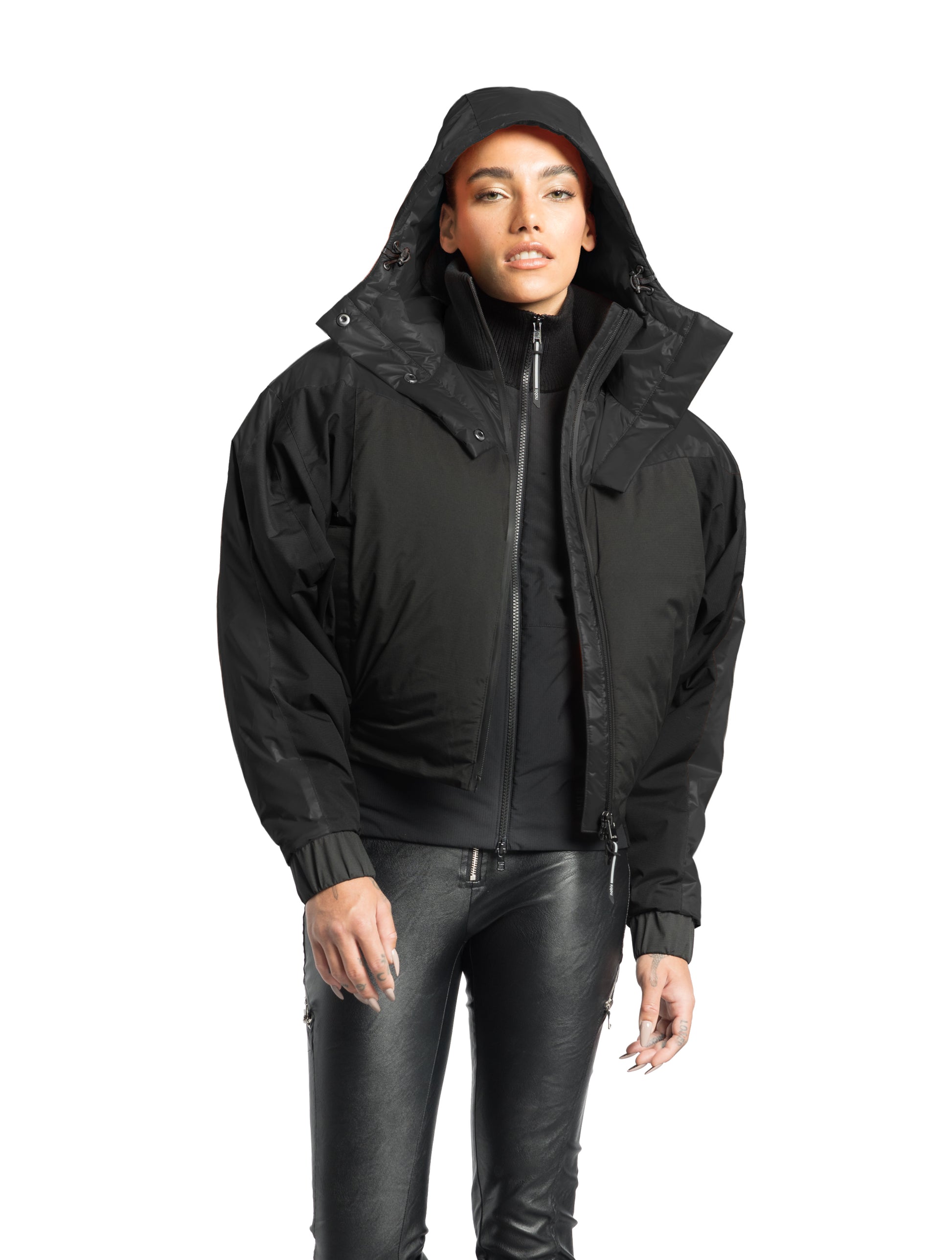 Aspen Women's Batwing Jacket in hip length, premium stretch ripstop and cire technical nylon taffeta fabrication, Premium Canadian White Duck Down insulation, non-removable down-filled hood, centre front two-way zipper, winged arm detailing, in Black