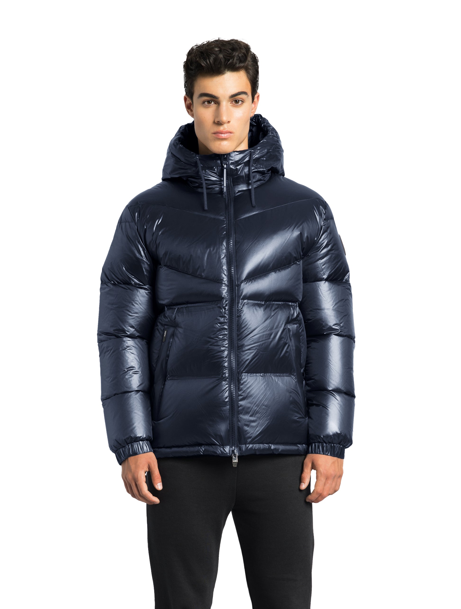 Dyna Men's Chevron Quilted Puffer Jacket in hip length, premium cire technical nylon taffeta fabrication, Premium Canadian origin White Duck Down insulation, non-removable down-filled hood, two-way centre-front zipper, fleece-lined zipper pockets at waist, pit zipper vents, in Navy