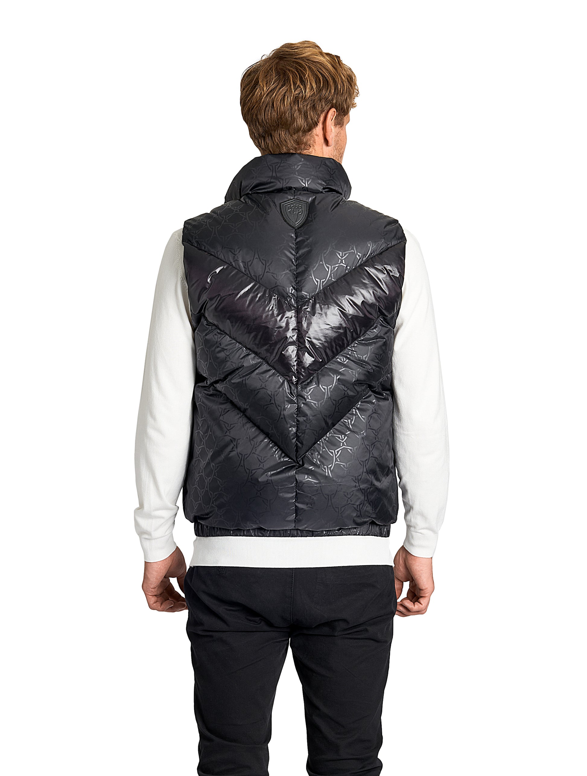 Kylo Men's Chevron Quilted Vest in hip length, premium cire technical nylon taffeta fabrication, Premium Canadian origin White Duck Down insulation, two-way centre-front zipper, fleece-lined pockets at waist, elasticized waistband, in Shield Monogram