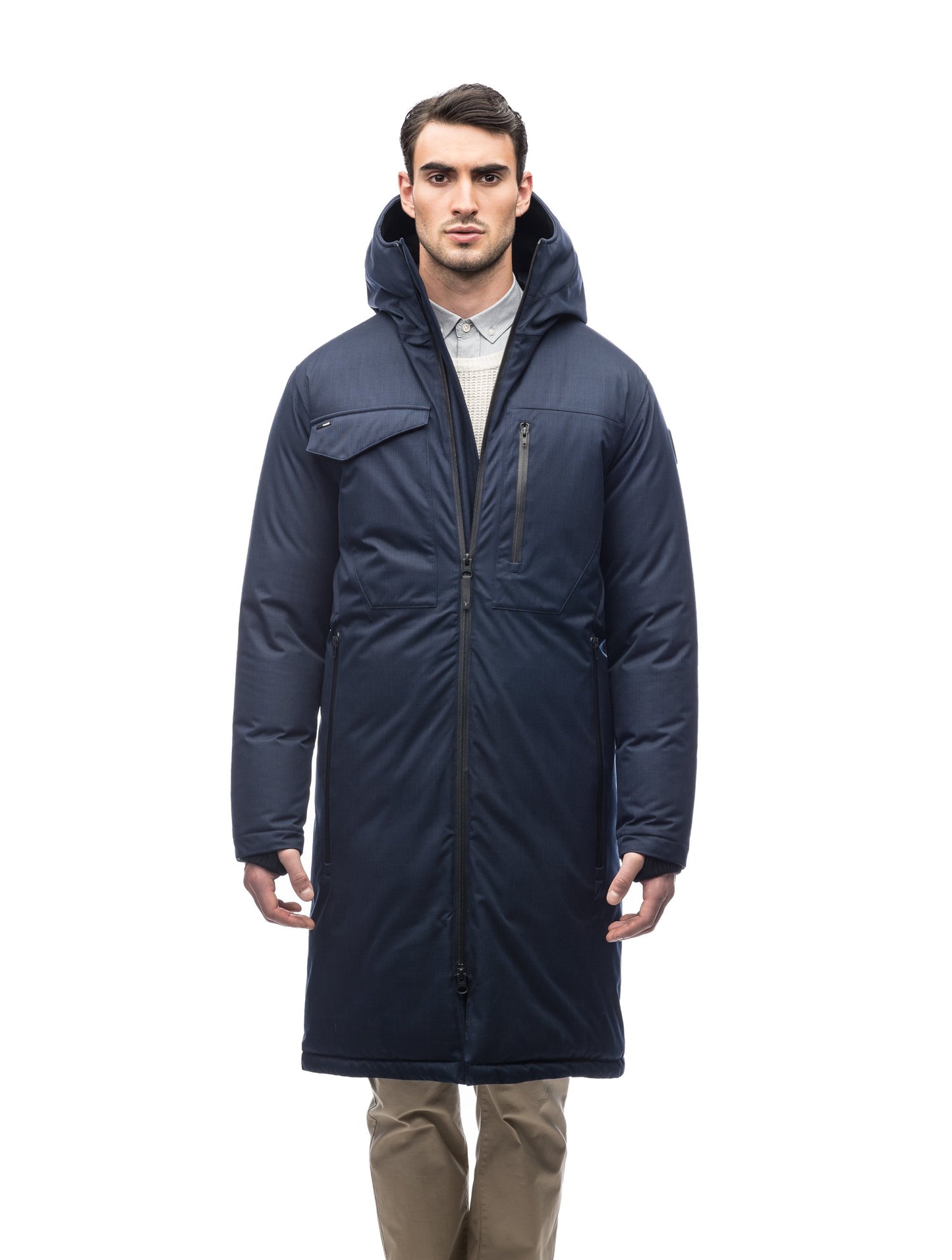 Long men's calf length parka with down fill and exposed zipper that features spacious pockets and zippered vents in Navy