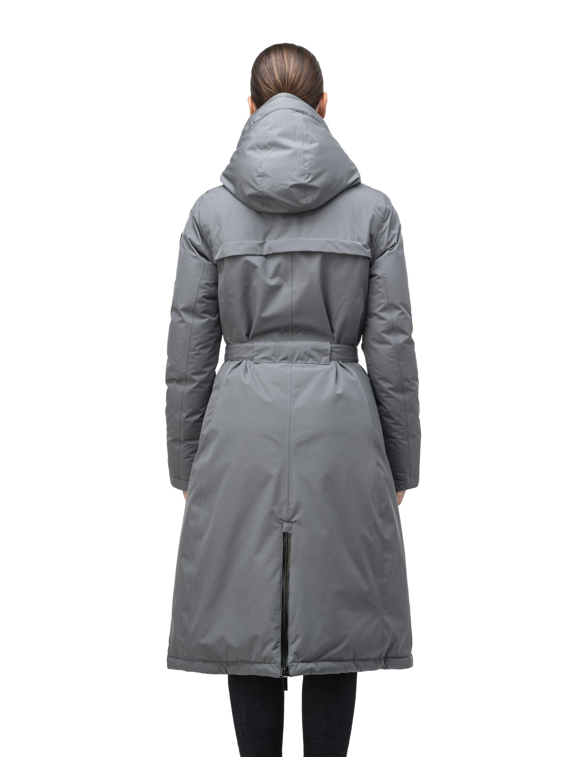 Long calf length hooded women's winter parka with an inner hip length closure, exterior hem length zipper and magentic placket in Concrete