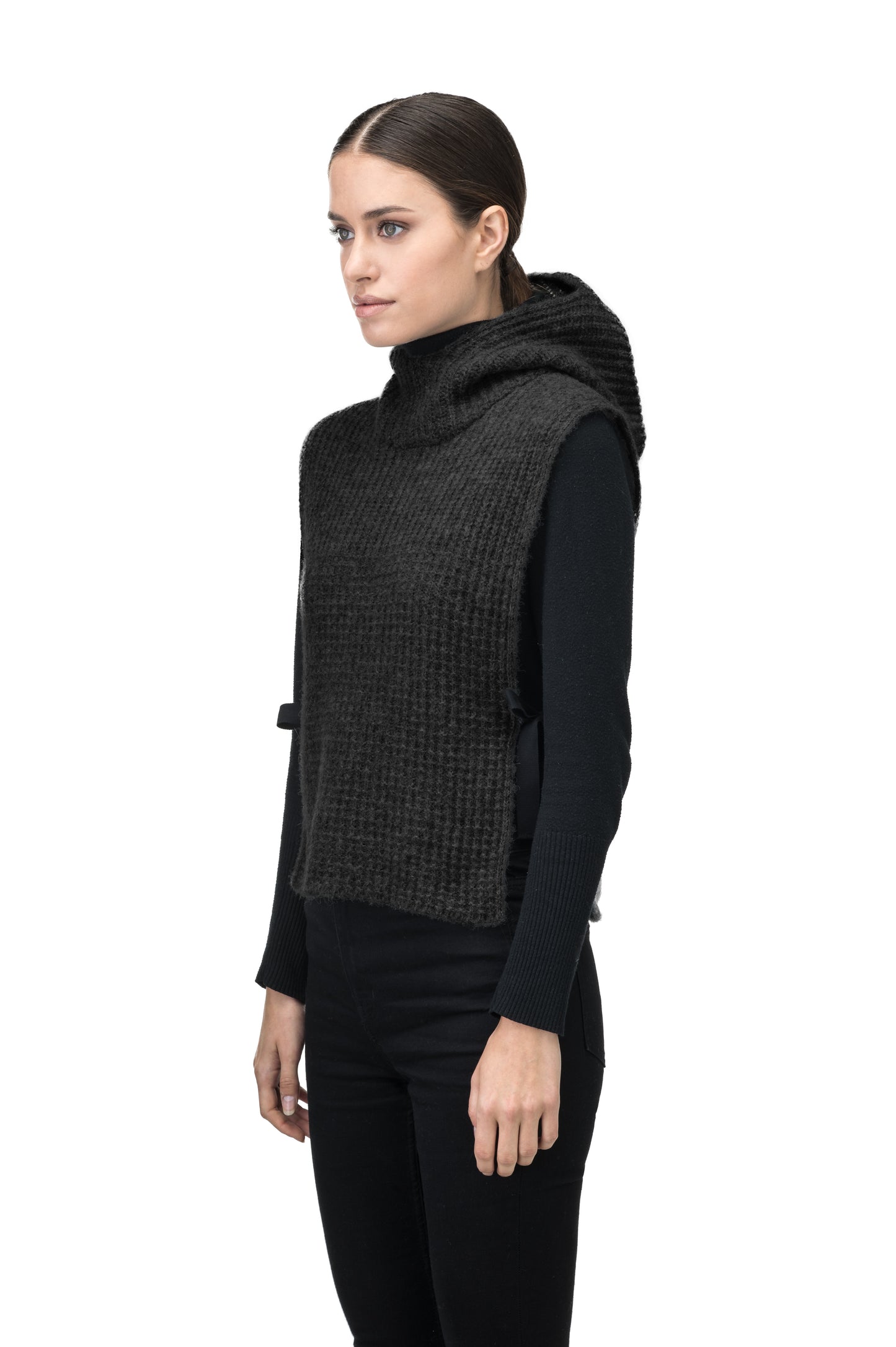 Nars Unisex Knit Hooded Dickie in in superfine alpaca and merino wool blend, waist length, fitted hood, sleeveless torso, and side webbing straps to adjust fit, in Black